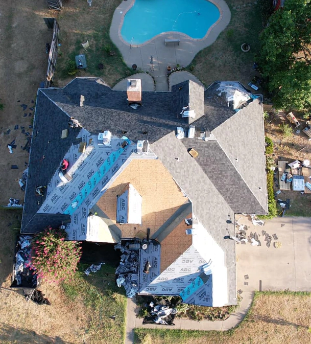 aerial view of a roof installation in progress